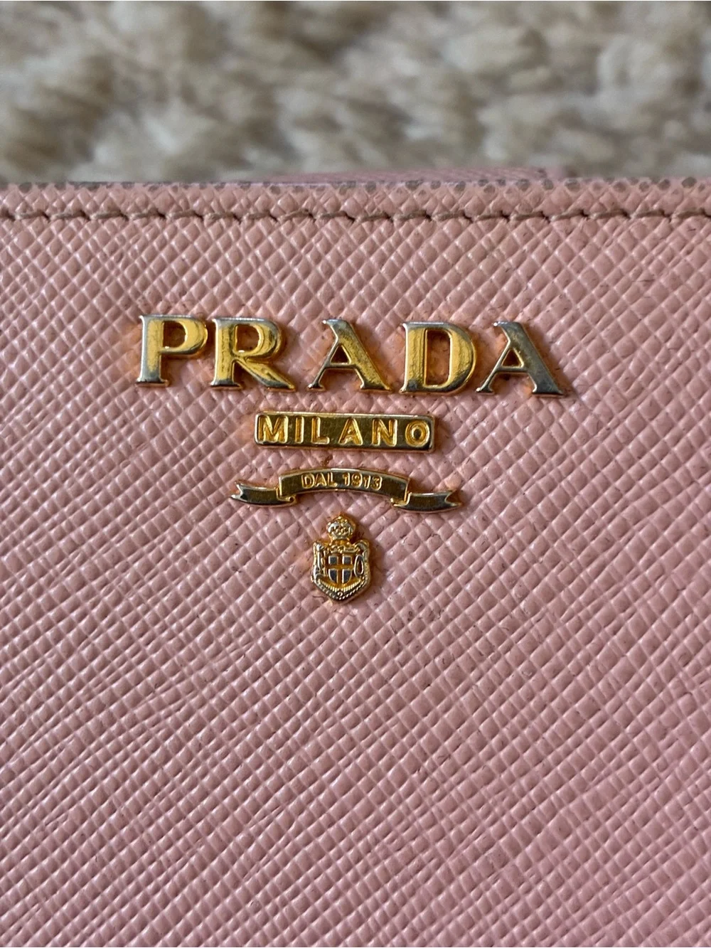 Prada pink saffiano leather wallet